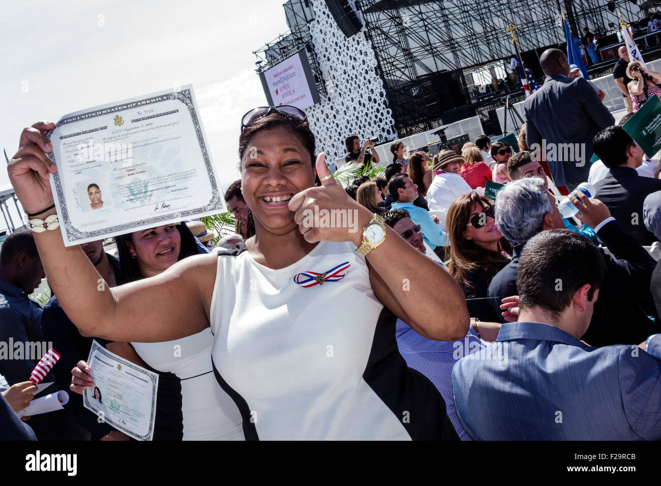 Miami Beach Florida,Oath of Citizenship Ceremony,immigrants,naturalization,citizen,swearing in,new citizens,allegiance,Certificate of Naturalization,s Stock Photo