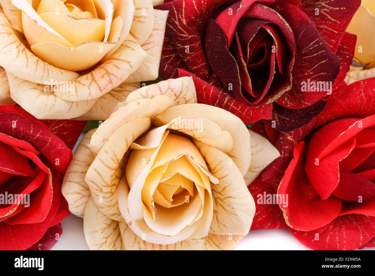 Red and yellow fabric roses closeup picture Stock Photo Alamy