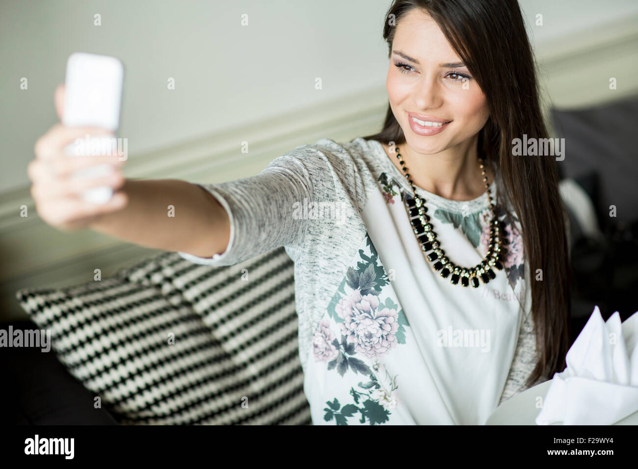 Young woman taking selfie Stock Photo - Alamy