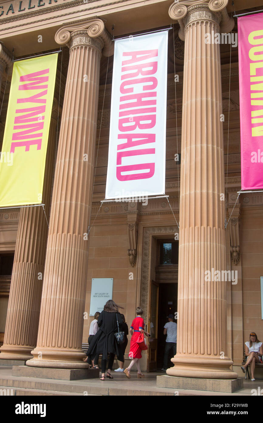 Art Gallery of New South Wales visitors enter the tourist attraction with banner promoting the Archibald Prize, Sydney,NSW,Australia Stock Photo