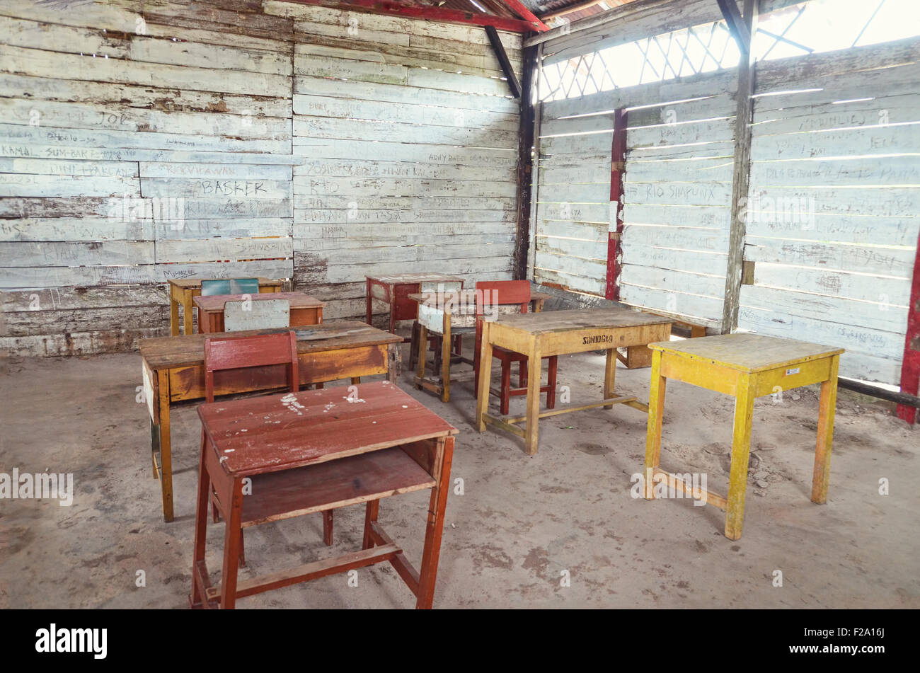 Table desks in an old classroom Stock Photo Alamy