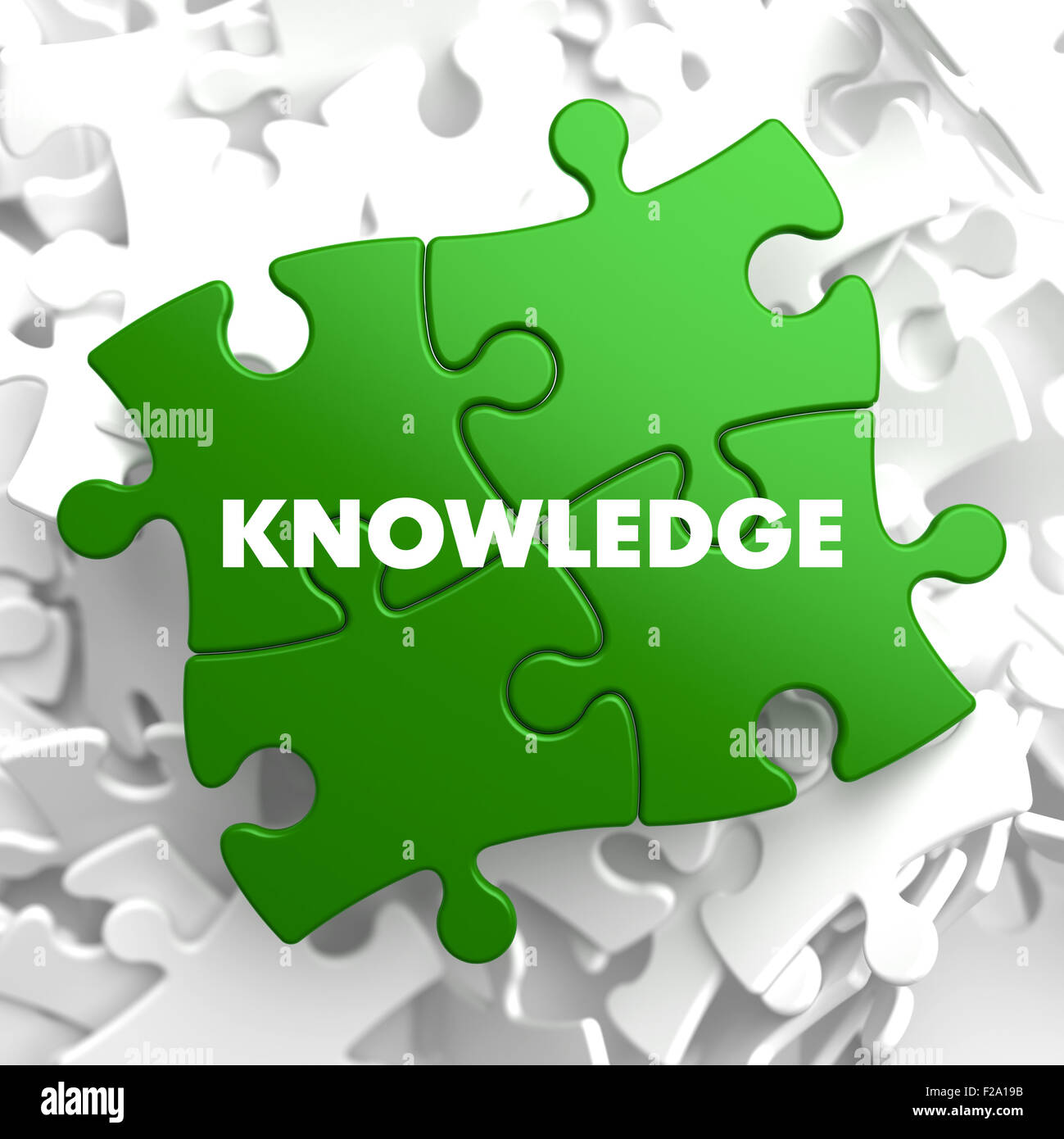 Knowledge on Green Puzzle. Stock Photo