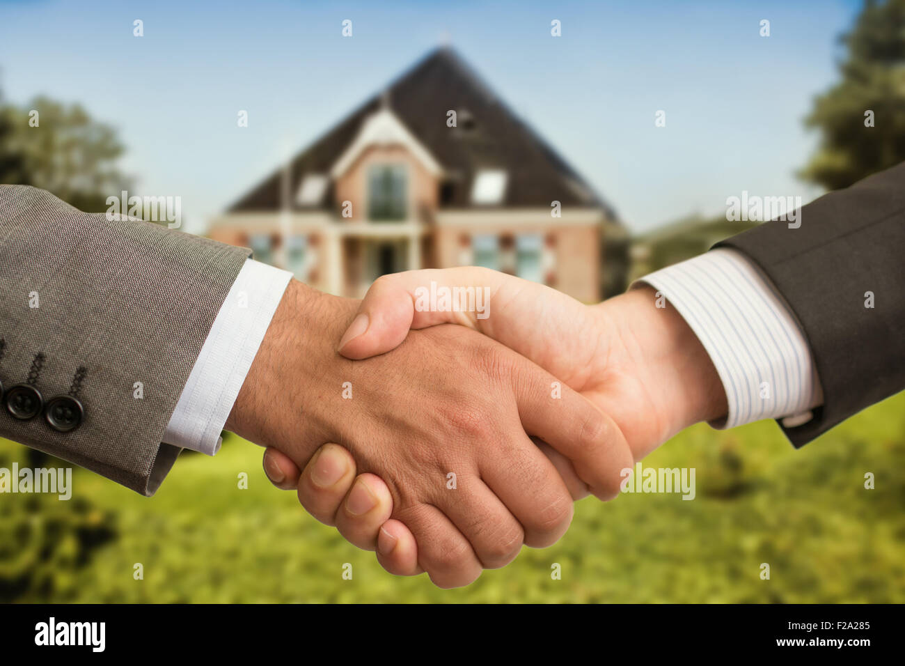 Handshaking for House Stock Photo