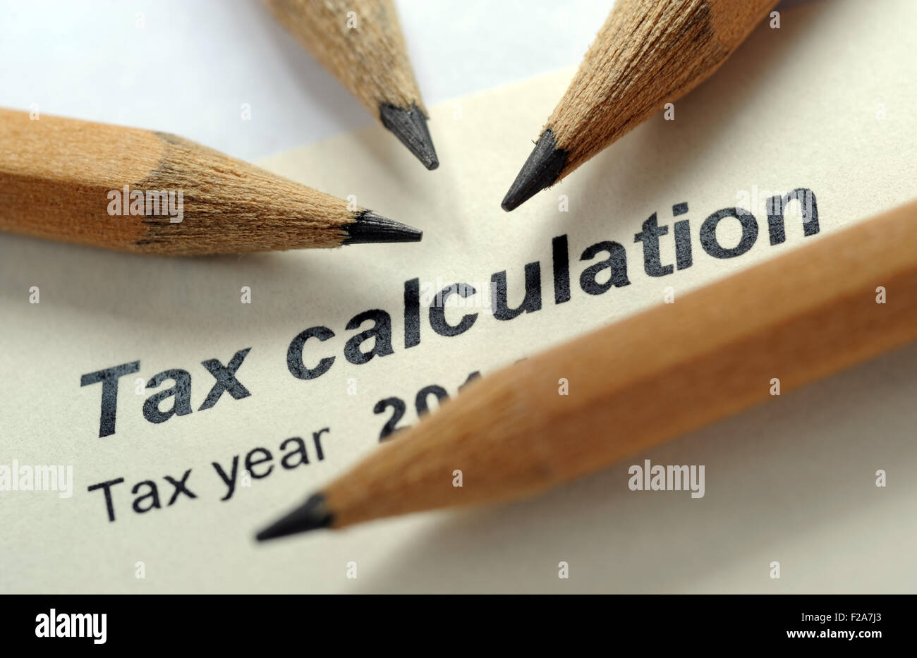 HMRC TAX CALCULATION LETTER WITH PENCILS RE INCOME SELF ASSESSMENT EMPLOYMENT AVOIDANCE HM REVENUE CUSTOMS TAXES FORM OWED UK Stock Photo