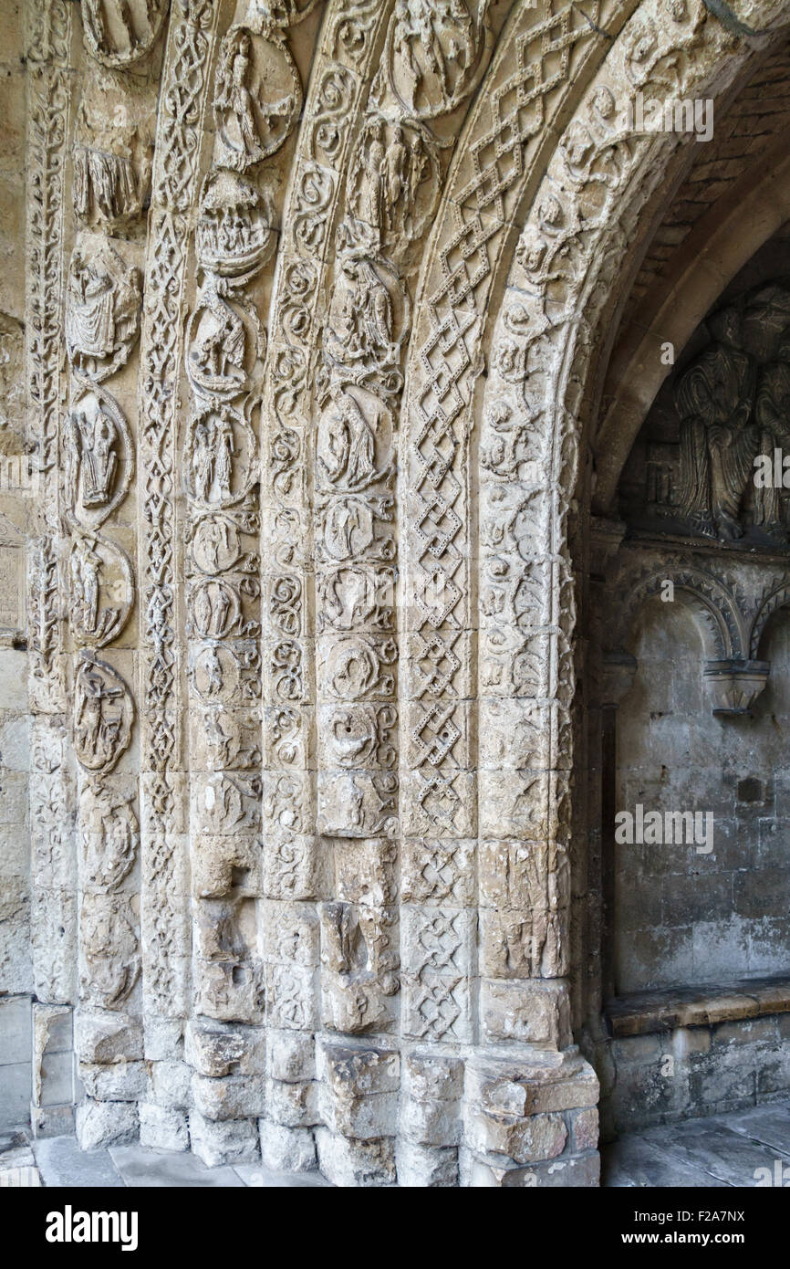 Malmesbury Abbey, Wiltshire, UK. Romanesque carvings in the twelfth century South Porch, the main entrance to the Abbey Stock Photo