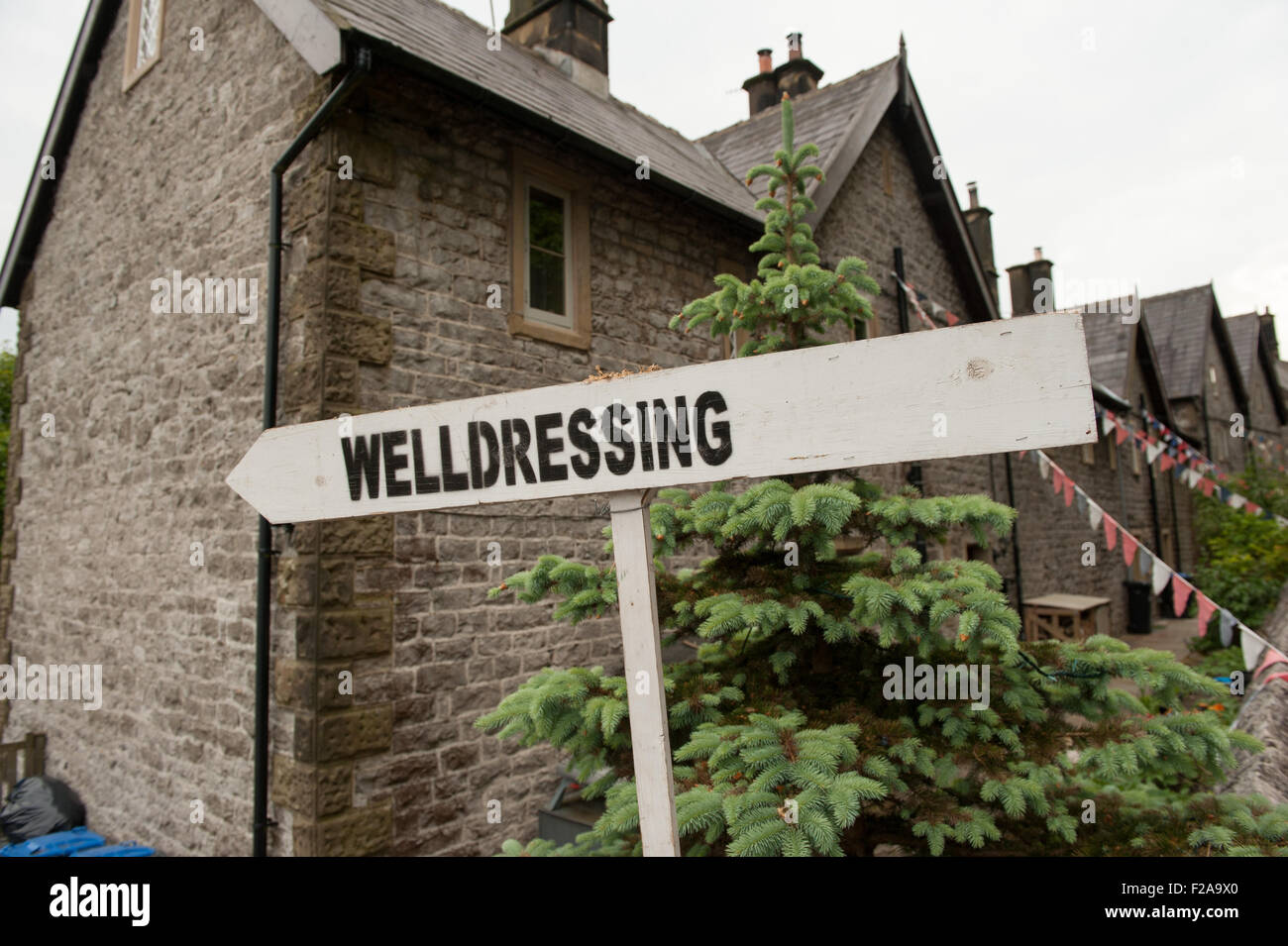 Well dressing (also once known as well flowering) is a summer custom practiced in rural England Stock Photo