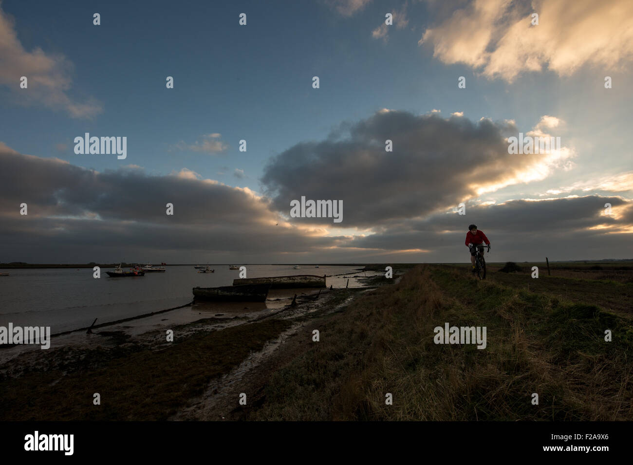 Cycling in the River Alde Estuary,Orford, Suffolk, England Stock Photo