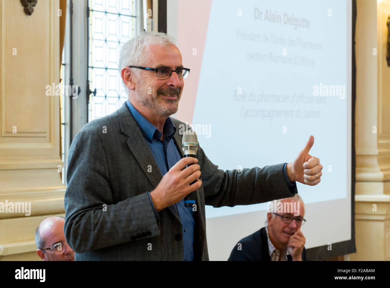 Paris, France. French Doctor Giving Presentation at Press Conference, HIV Auto-Test Release, 'Tim Graechen' Talking with microphone Stock Photo