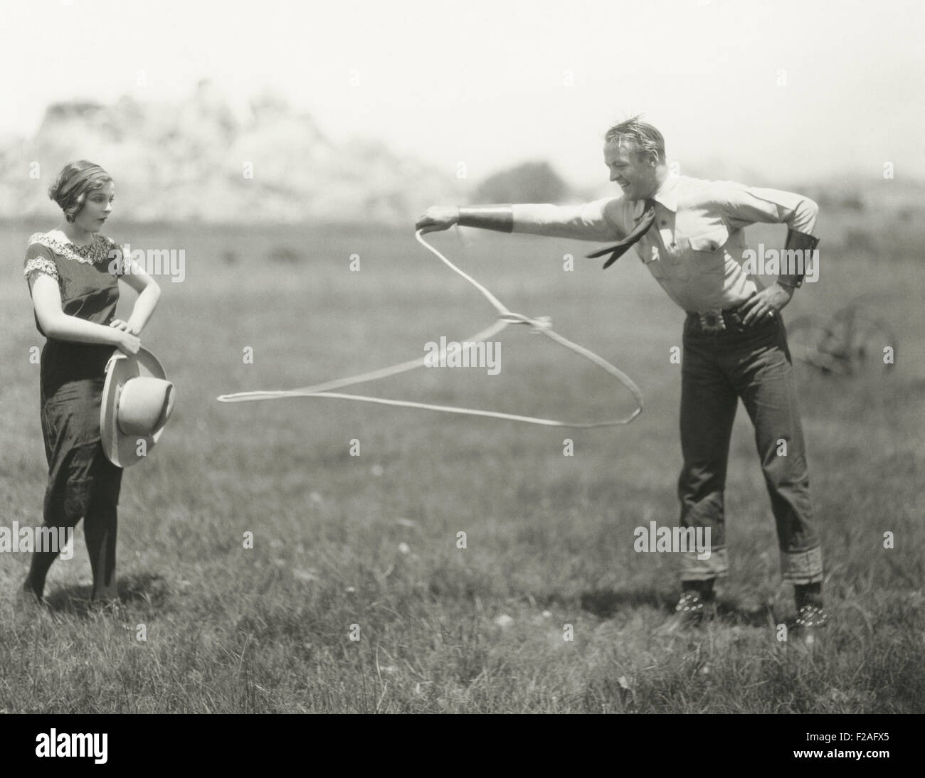 Cowboy showing off his roping skills (OLVI008 OU285 F) Stock Photo