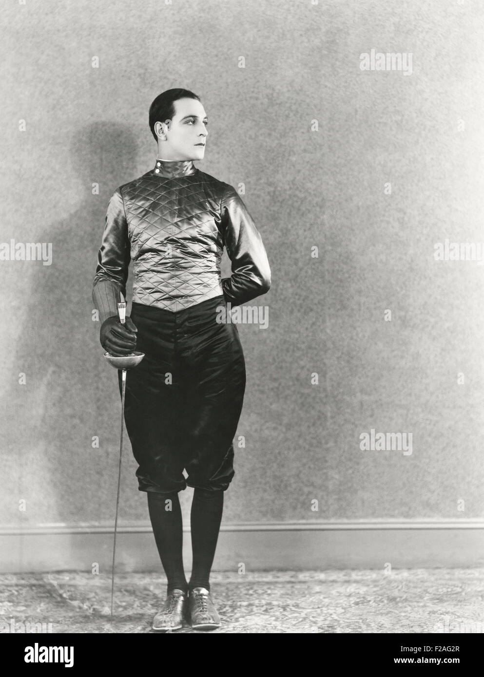 Swordsman posing with fencing foil (OLVI008 OU270 F) Stock Photo