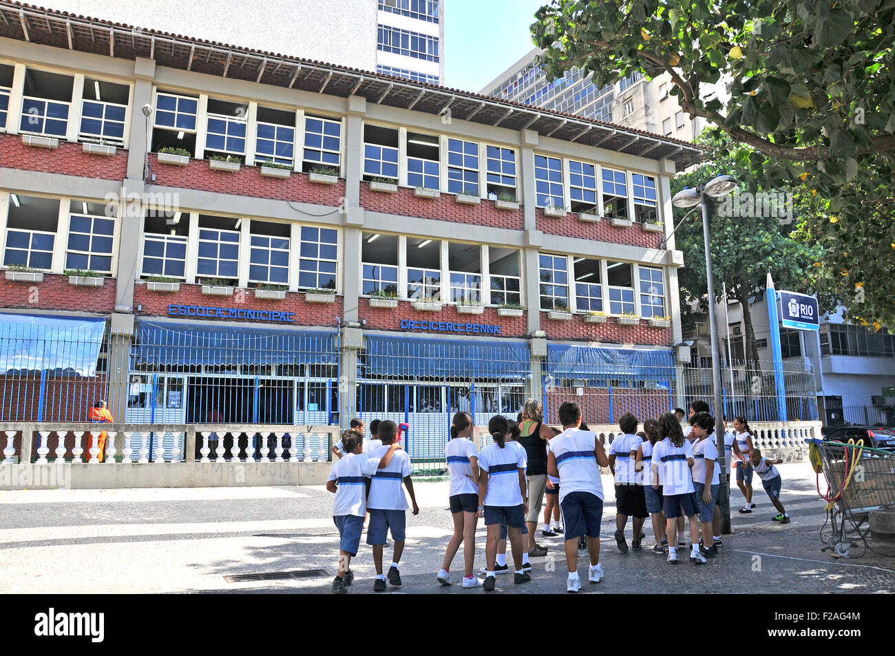 group of primary children before  Dr Cicero Pena municipal school Rio de Janeiro Brazil Stock Photo