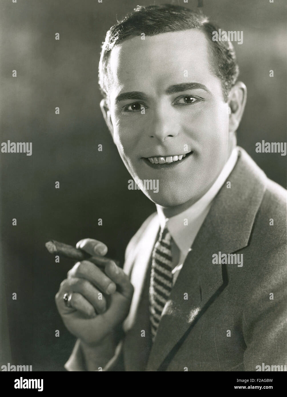 Enjoying a cigar (OLVI008 OU190 F) Stock Photo