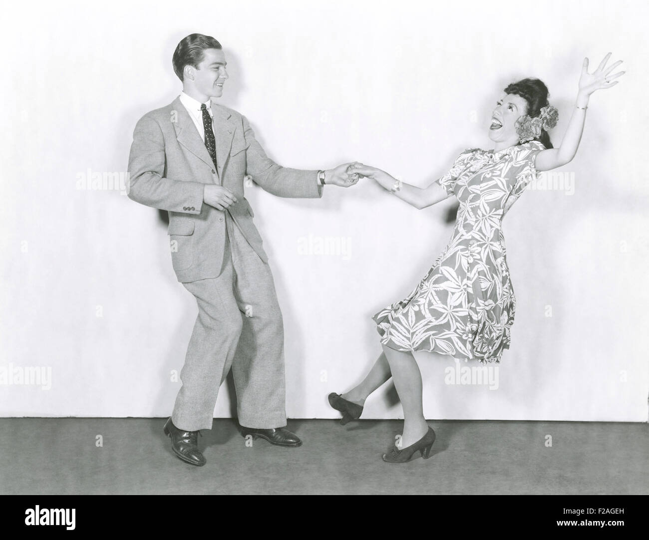 Swing dance 1940s hi-res stock photography and