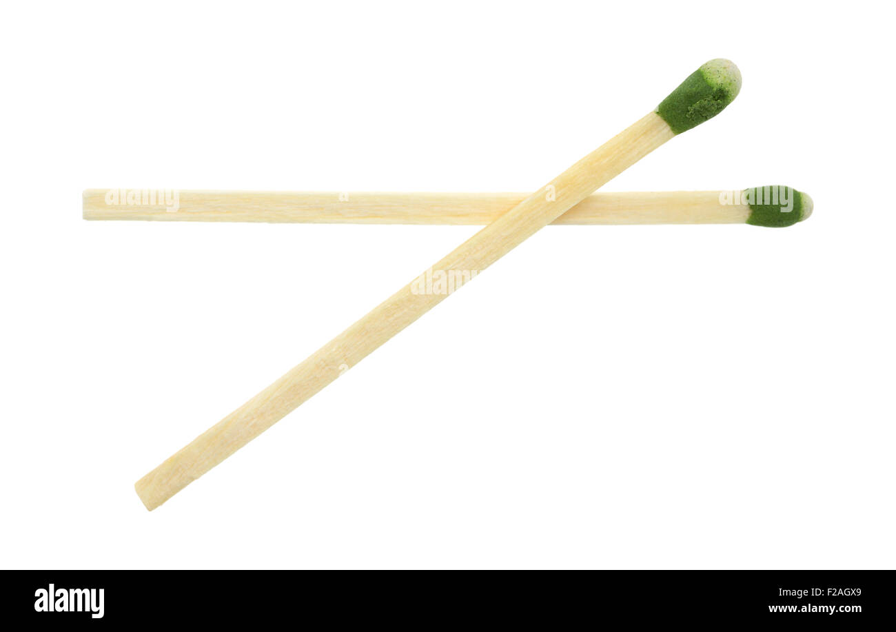 Two green tipped wood large kitchen matches isolated, on a white background. Stock Photo