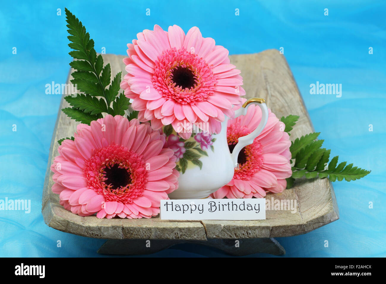 Happy birthday card with pink gerbera daisies Stock Photo Alamy