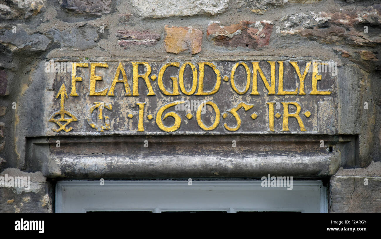 "FEAR GOD ONLYE 1605". Inscription above doorway. Gloucester Street, Edinburgh, Mid Lothian, Scotland, United Kingdom, Europe. Stock Photo