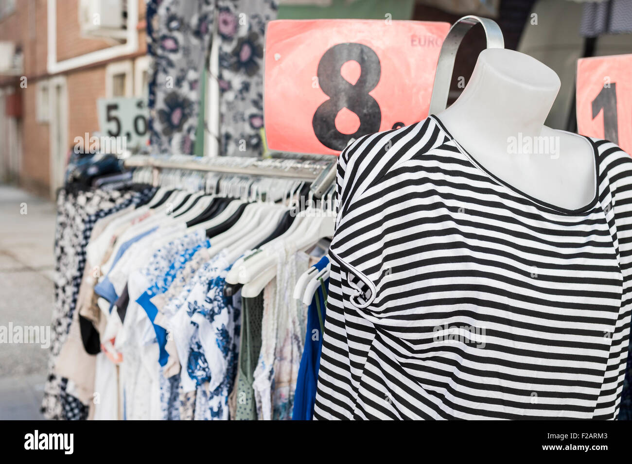 Clothes for sale at a local outdoor market. Italy Stock Photo Alamy
