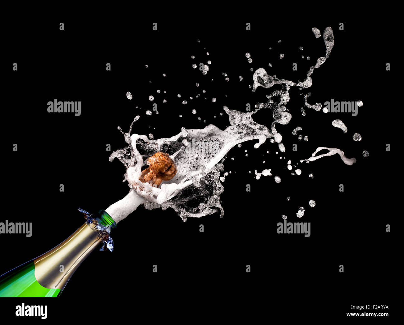detail of popping champagne on black background Stock Photo