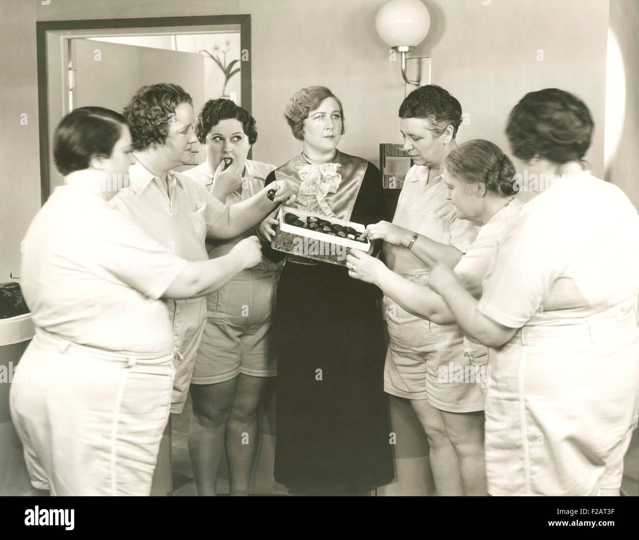 Cheating on their diet (OLVI007 OU558 F) Stock Photo