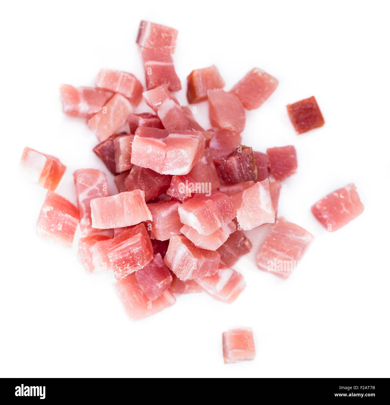 Portion of fresh diced Ham isolated on pure white background Stock