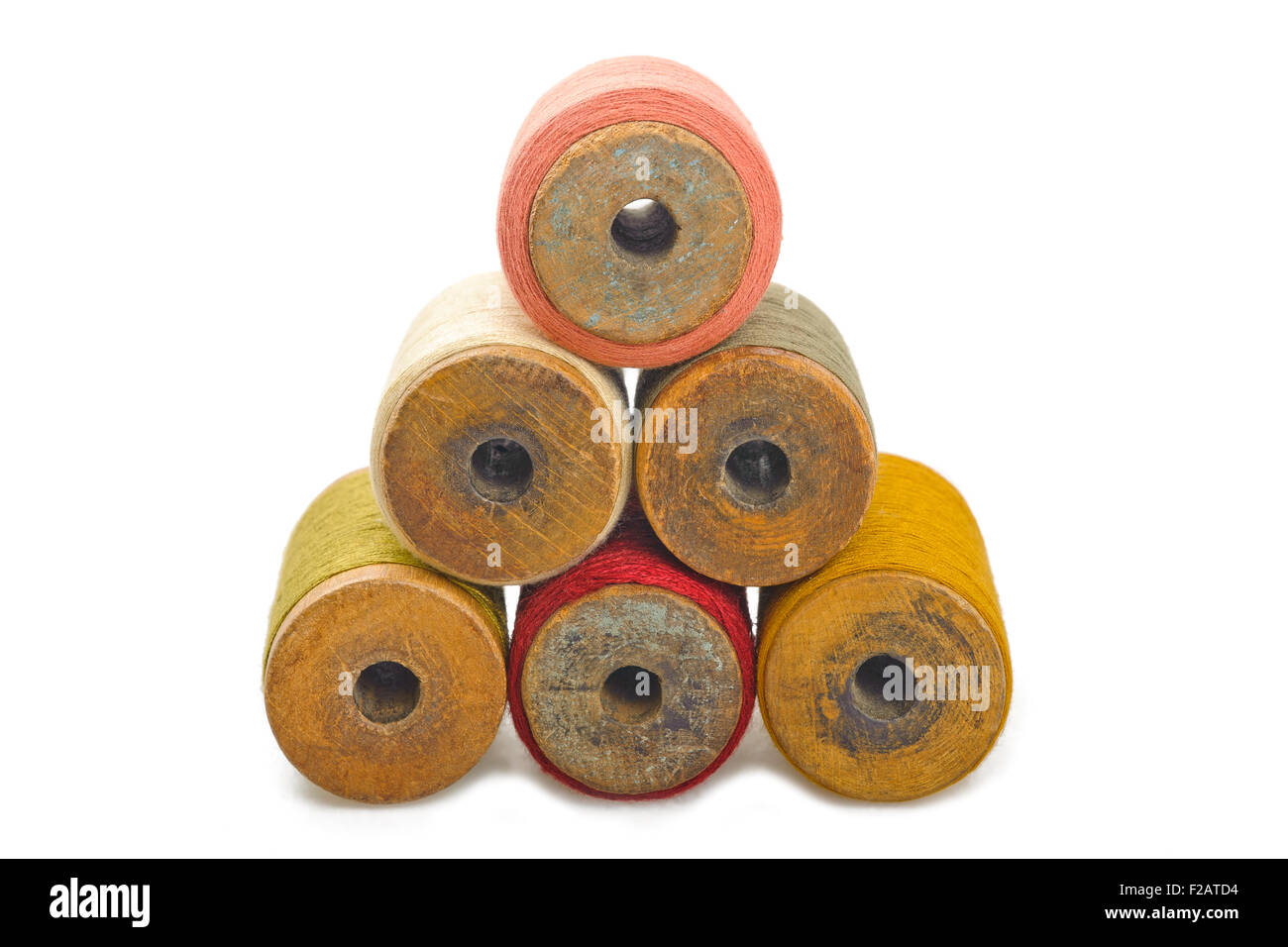 Colored spools of cotton thread isolated on white Stock Photo