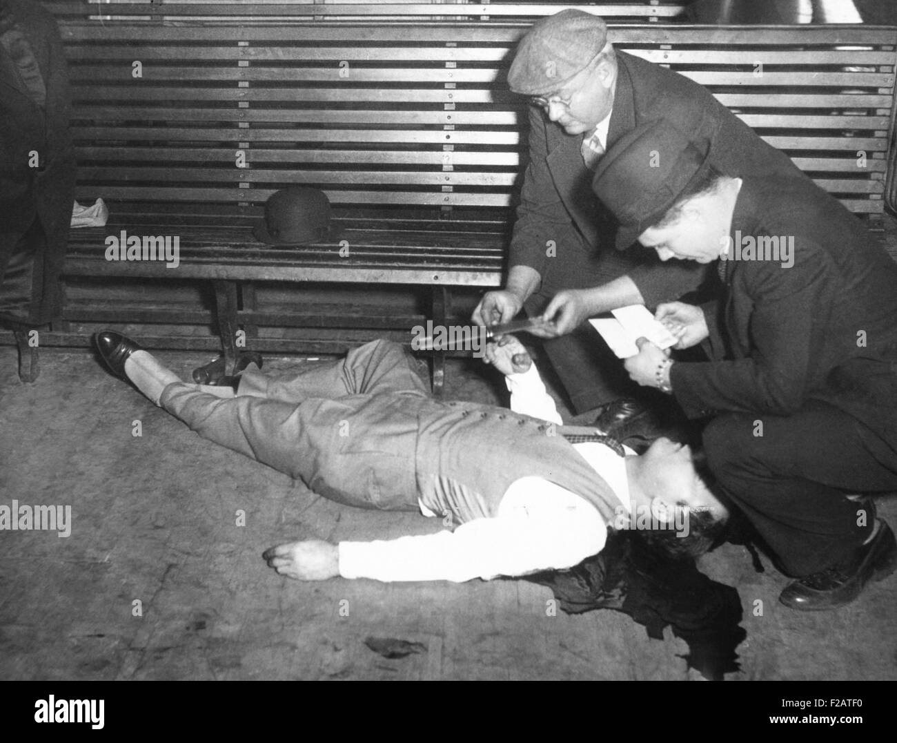 Gangster Jack McGurn lying dead in a Chicago bowling alley, Feb. 15, 1936. He was killed by three gunmen on the seventh anniversary of the St. Valentine's Day Massacre. The killers tossed a Valentine card near his body. He had been indicted for the massacre, but was never brought to trial. McGurn was played by Clint Ritchie in the 1967 film ST. VALENTINE'S DAY MASSACRE and by Carmen Argenziano in 1975 in CAPONE. (CSU 2015 11 1668) Stock Photo