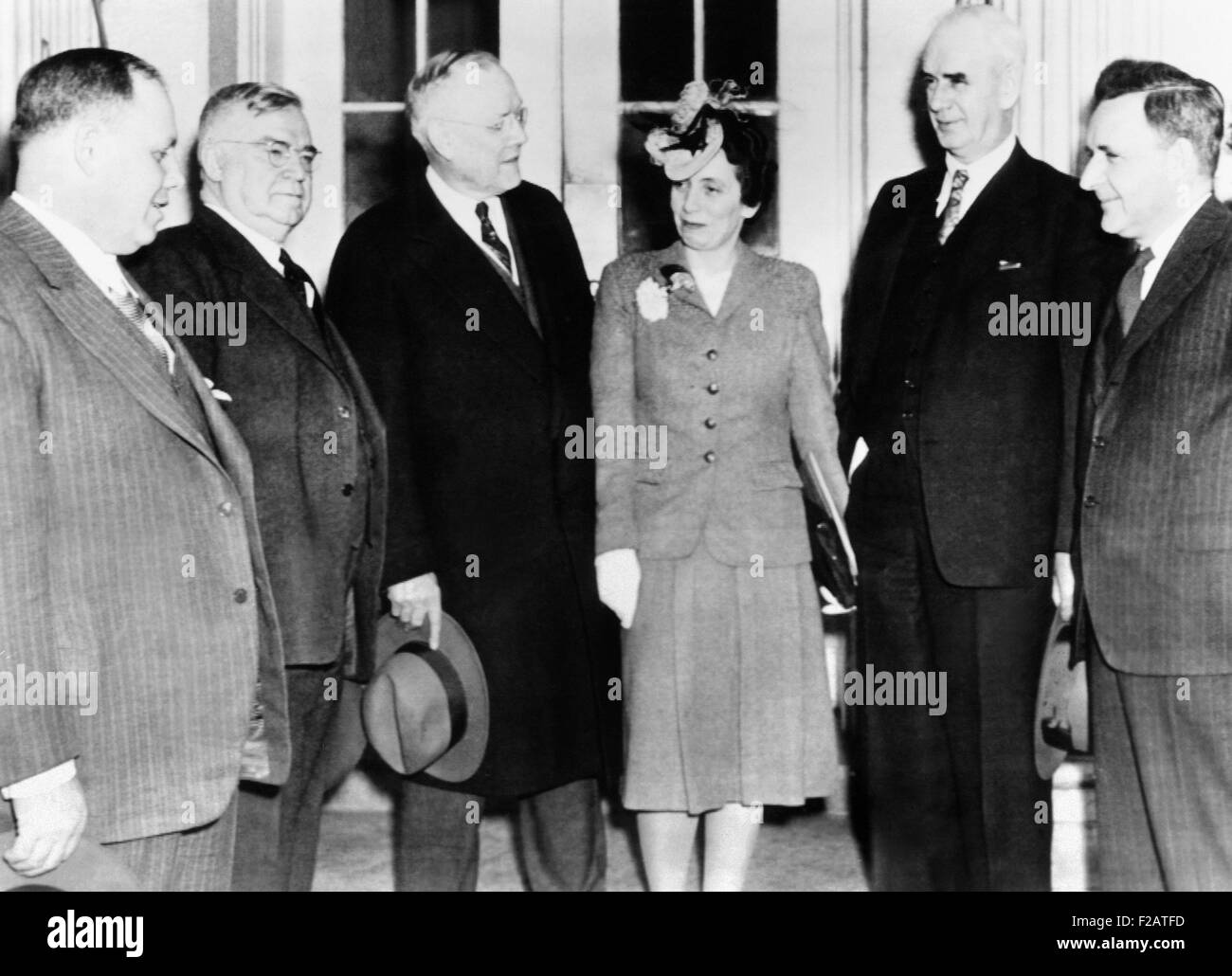 National War Labor Board at the White House met with President Franklin Roosevelt. April 1, 1943. The board arbitrated labor disputes to maintain wartime industrial productivity. L-R: George Meany; Al Johnson; William Green; Anna Rosenberg; Philip Murray, and Julius Emspak. (CSU 2015 11 1657) Stock Photo
