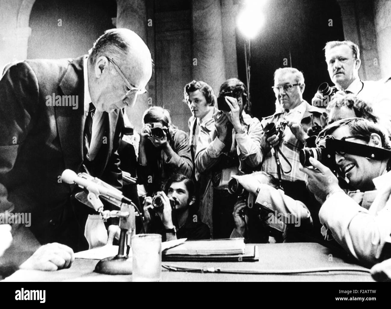 Former Atty. Gen. John Mitchell surrounded by photographers at