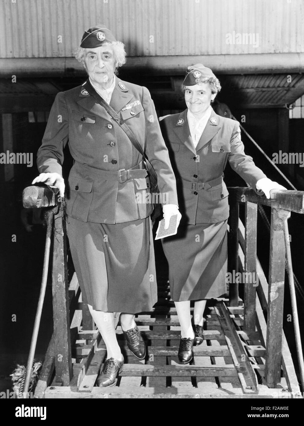 Anne Tracy Morgan and Mrs. W. R. Heberhart boarding the French liner Oregon. June 23, 1945. They were sailing for France in connection with Anne Morgan's philanthropy in France. (CSU 2015 11 1519) Stock Photo