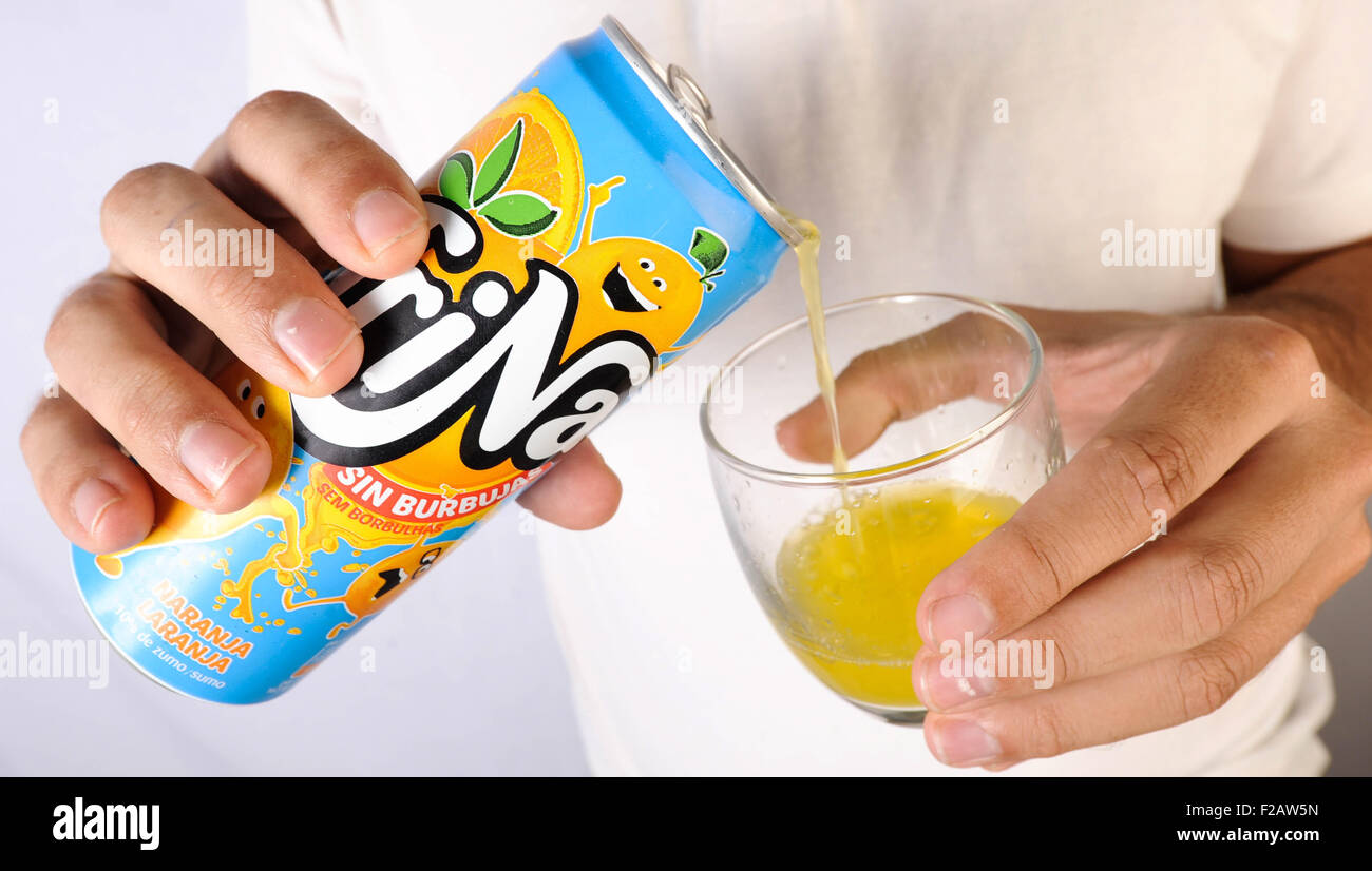 drinking refreshing drink without bubbles Trina-bebiendo bebida refrescante sin gas Trina Stock Photo