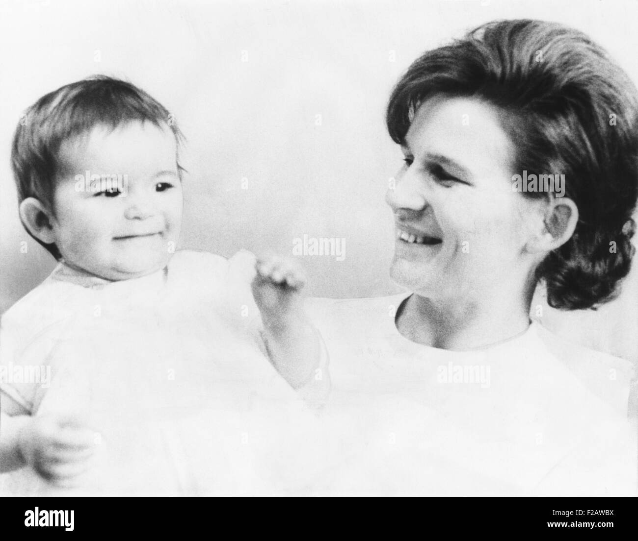 Russian cosmonaut Valentina Nikolayeva-Tereshkova with her one-year-old daughter, Alyenushka. Valentina married cosmonaut Adrian Nikolayeva shortly after she became the first woman to be launched into space. Valentina became a prominent member of the Communist Party of the Soviet Union, and remained politically active following the collapse of the USSR in 1991. (CSU 2015 11 1422) Stock Photo