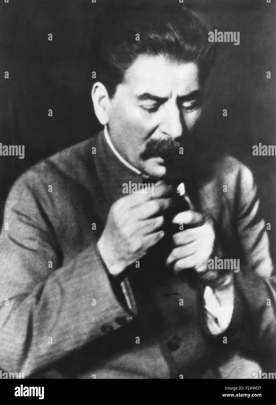 Josef Stalin head of the Communist Party of the Soviet Union lighting his pipe. May 10, 1935. (CSU 2015 11 1378) Stock Photo