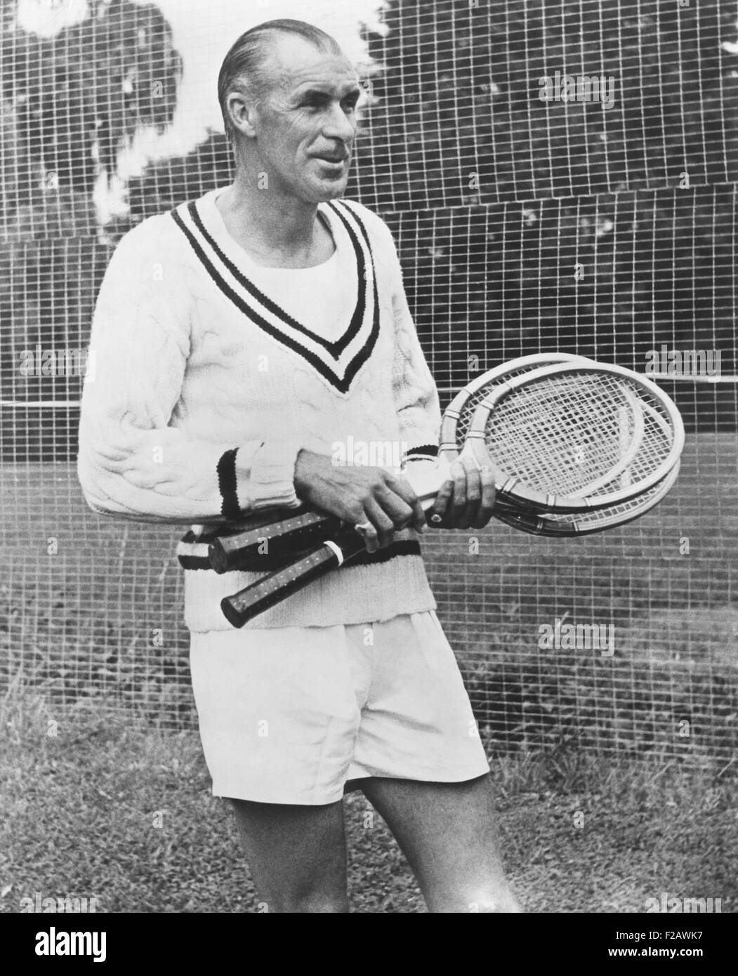 Bill Tilden, former Tennis Champion, ca. 1951. He was isolated from former friends and associates after his two imprisonments on homosexual related morals charges. Charlie Chaplin allowed Tilden to use his private court for lessons to help him continue working. (CSU 2015 11 1332) Stock Photo