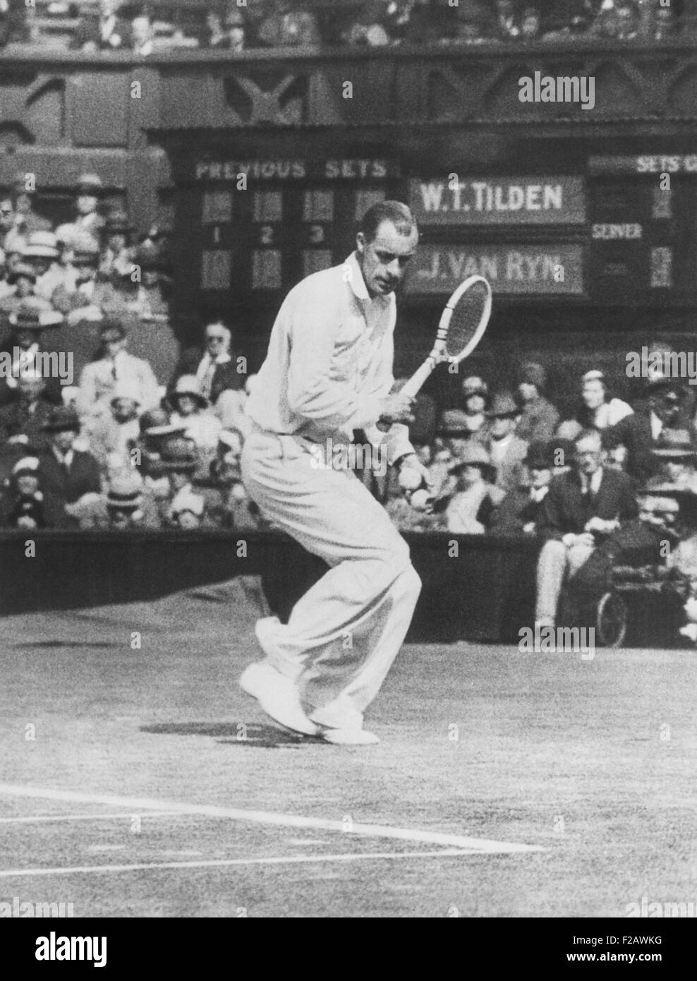 Bill Tilden as he played against John Van Ryn, at Wimbledon, July 2, 1930. Tilden defeated Van Ryn in three sets, 7-5, 6-4, 6-1, in the third round of Men's Singles. Tilden went on the win the 1930 Men's Singles at Wimbledon. (CSU 2015 11 1325) Stock Photo