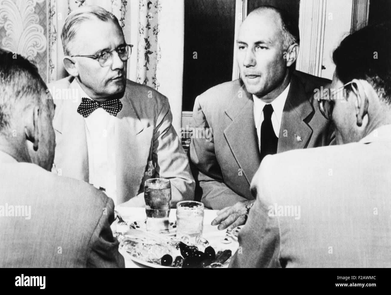 Governor Strom Thurmond of South Carolina meets with Dixiecrat politicians on July 24, 1948. Gov. Thurmond was running for president on the States' Rights Democratic Party, a.k.a. Dixiecrats, to opposition the Civil Rights positions of both the Republican and Democratic parties. They hoped to win enough votes to put the election into the House of Representatives, but Truman won. At left is Mississippi Gov. Fielding Wright, Dixiecrat V.P. candidate. (CSU 2015 11 1305) Stock Photo