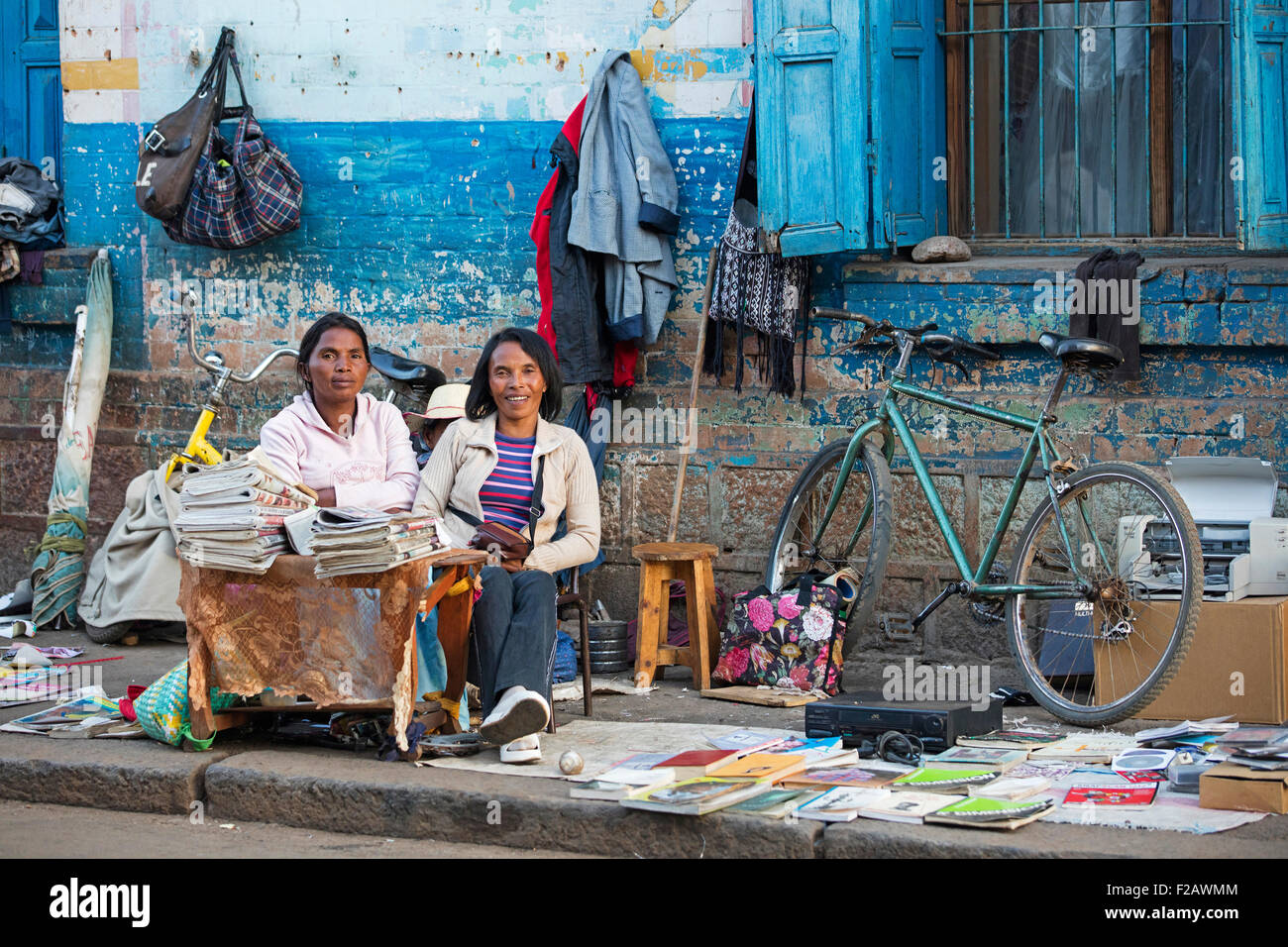 Malagasy women selling books and newspapers in the streets of the city Antsirabe, Vakinankaratra, Madagascar, Southeast Africa Stock Photo