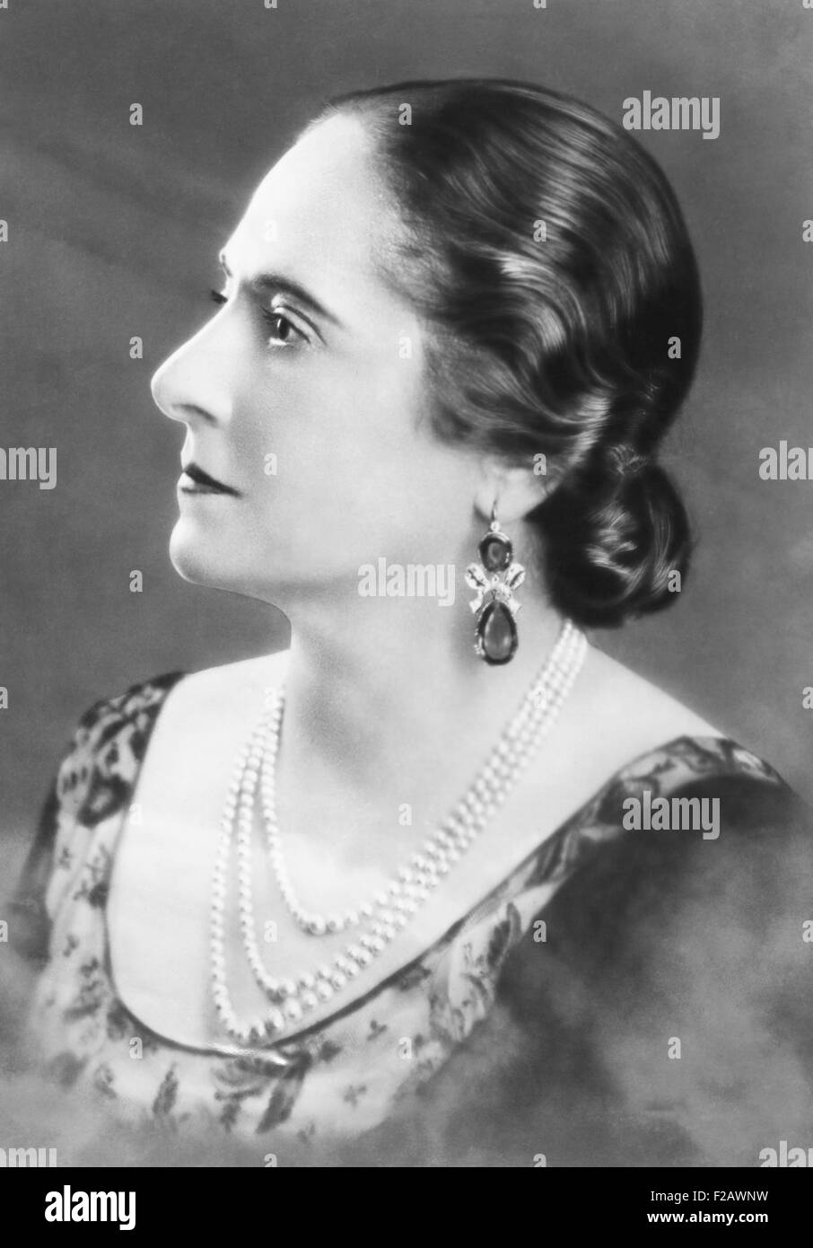 Helena Rubenstein internationally famous cosmetics mogul ca. 1930s. Profile portrait with precious stone earrings and pearls was taken as she neared her 60th birthday and was a multi-millionaire. (CSU 2015 11 1272) Stock Photo