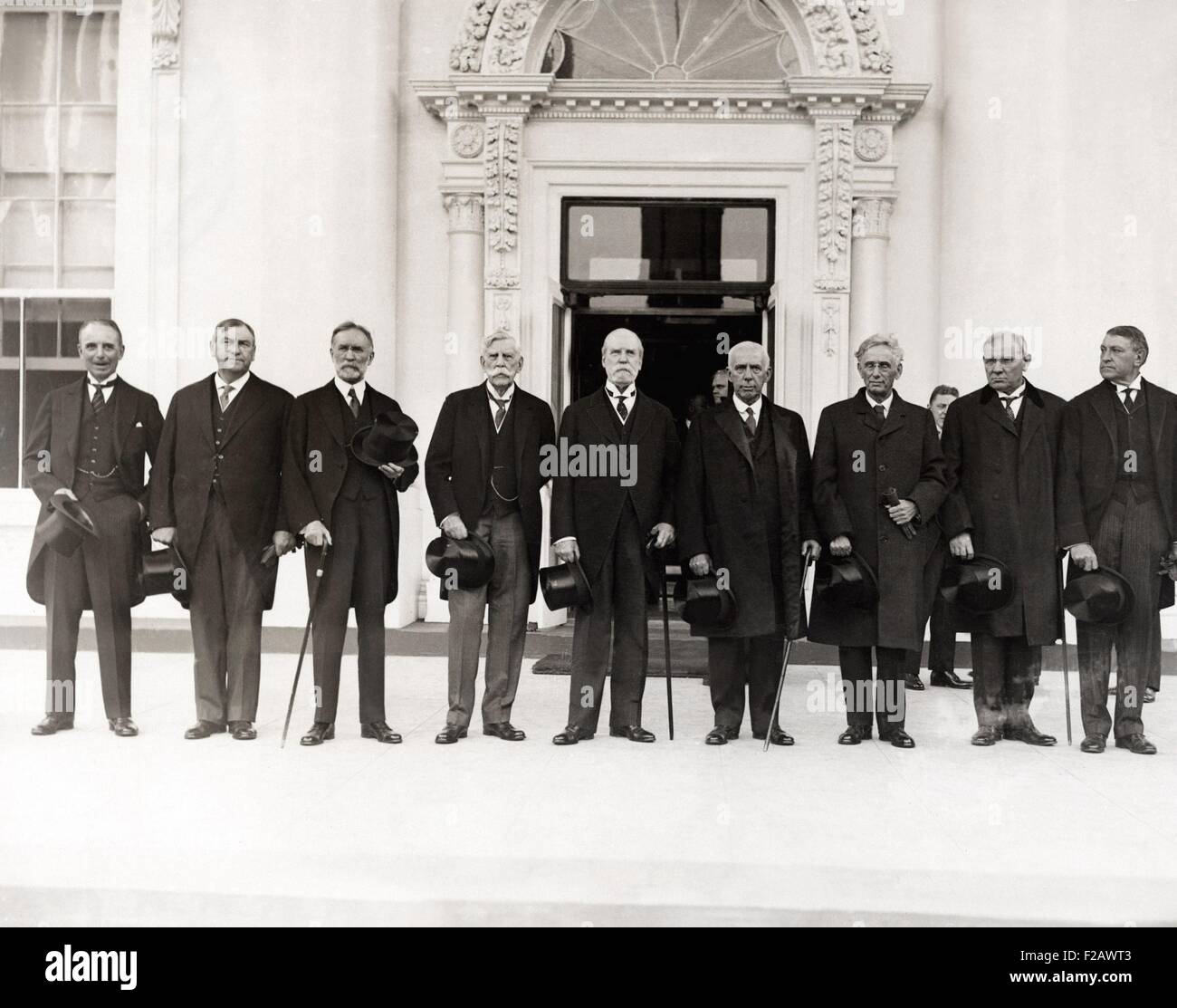 Chief Justice Charles Evans Hughes with Supreme Court Justices at the White House, Oct. 13, 1930. They notified President Herbert Hoover that the Court was in session. L-R: William Mitchell, Atty. Gen.; Harlan Fiske Stone; George Sutherland; Oliver Wendell Holmes; Charles Evans Hughes; Willis Van Devanter; Louis D Brandeis; Pierce Butler; and Owen J. Roberts. Hughes was portrayed by Louis Calhern in the 1946 stage play, and 1950 film, THE MAGNIFICENT YANKEE. (CSU 2015 11 1210) Stock Photo