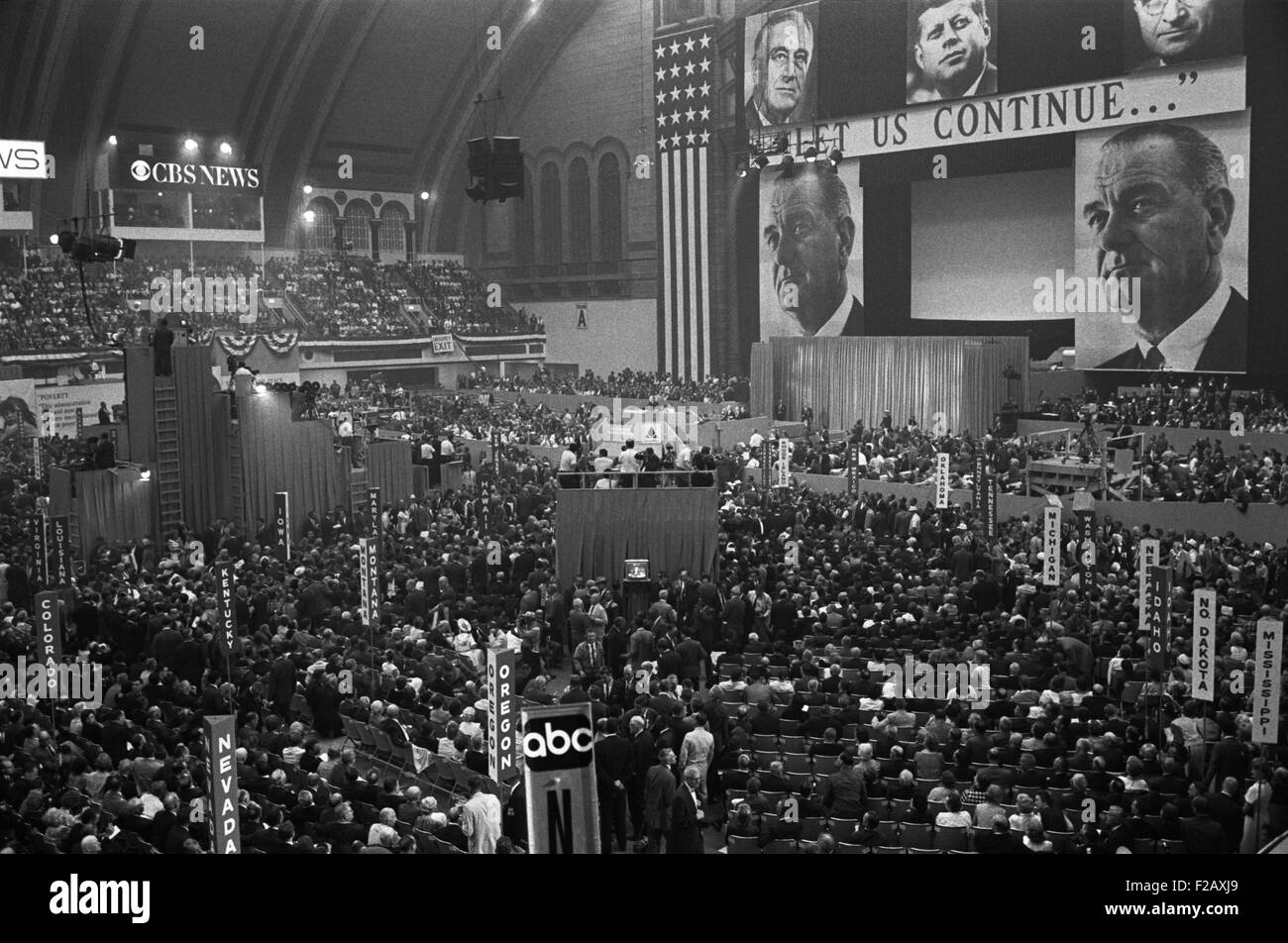 1964 Democratic Convention, Atlantic City, New Jersey. View of delegates and large pictures of