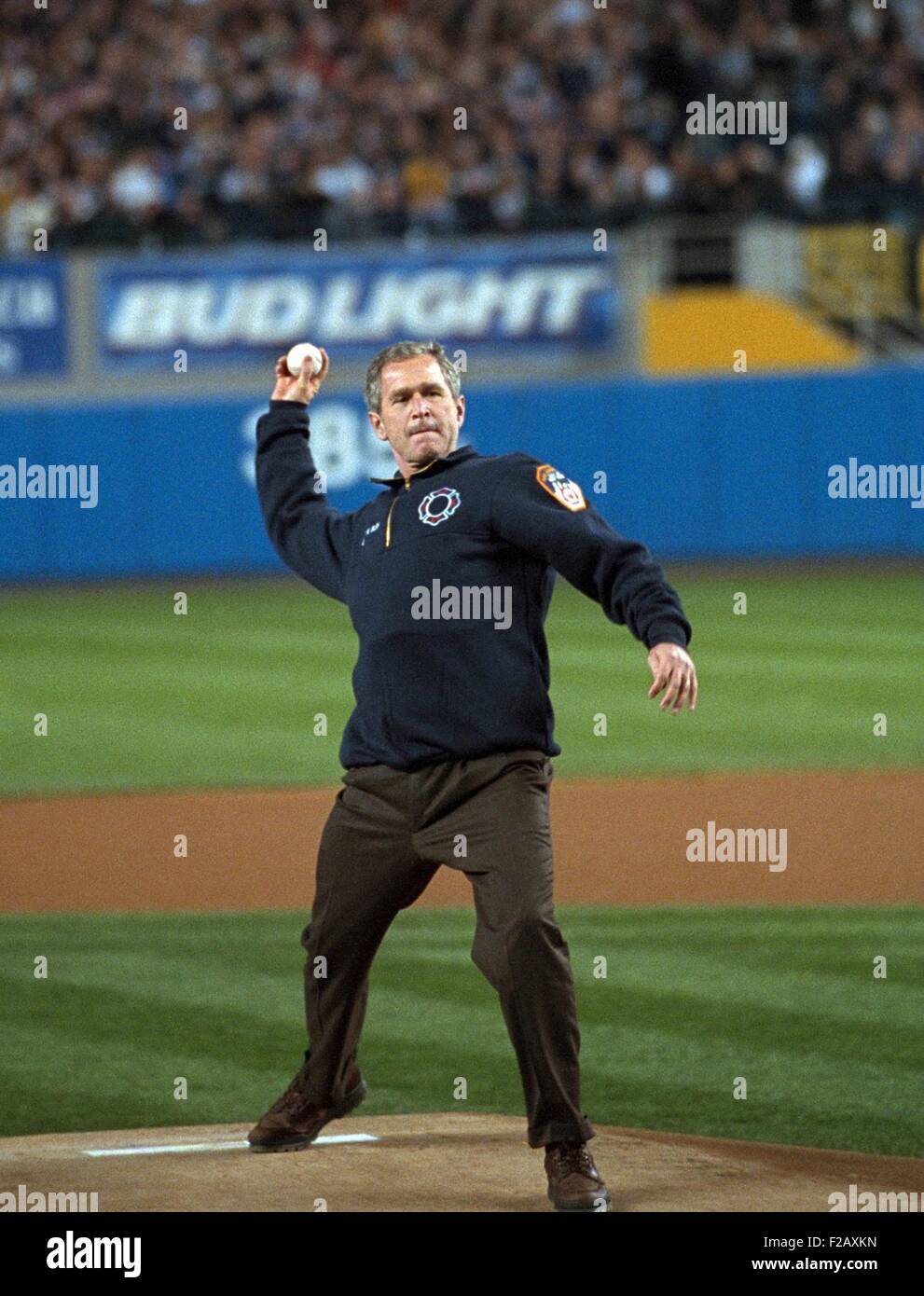 President George W. Bush throws the ceremonial first pitch at Yankee Stadium. Oct. 30, 2001. Game three between the Arizona Diamondbacks and the New York Yankees. (BSLOC 2015 2 181) Stock Photo