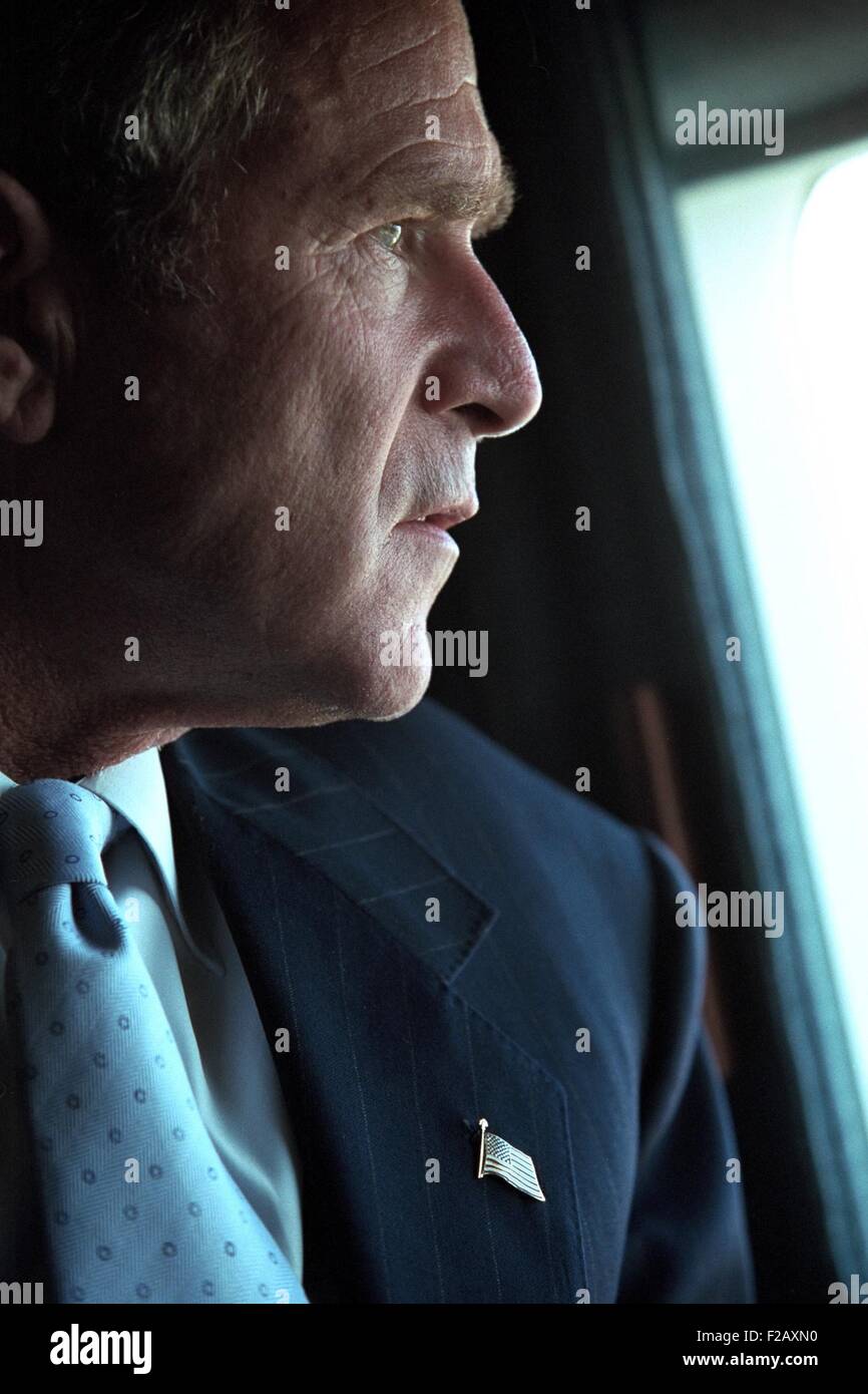 President George W. Bush surveys the damage to the Pentagon from Marine One, Sept. 14, 2001. Three days after the 9-11 Terrorist Attacks, Bush 43 was enroute to New York City to visit the devastated World Trade Center site. (BSLOC 2015 2 152) Stock Photo