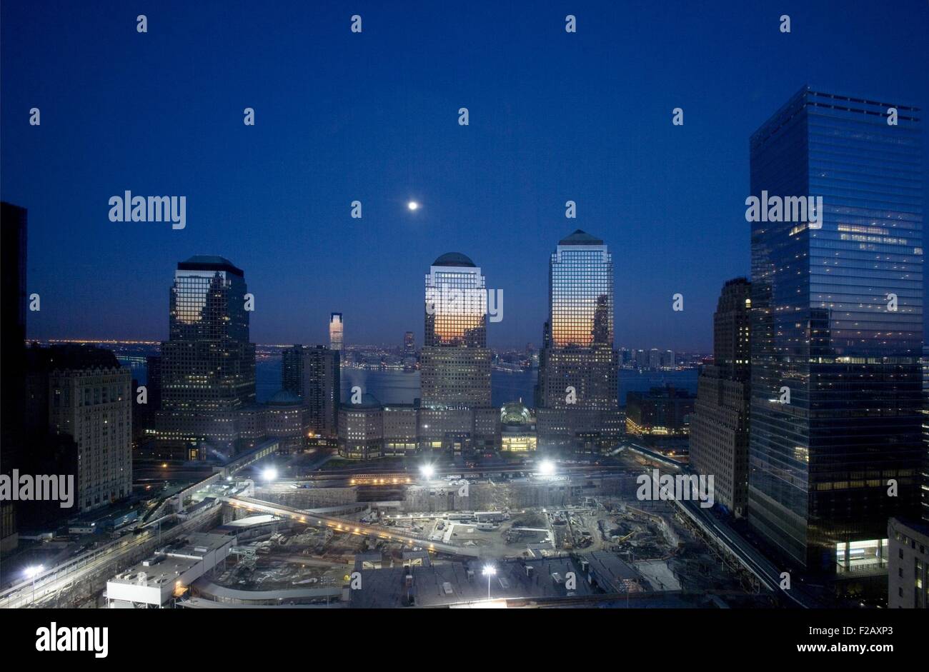 Night view of the 16 acre World Trade Center site under reconstruction. View is to the West, with three buildings of the World Financial Center, the Hudson River and in the distance, New Jersey. Photo by Carol Highsmith. (BSLOC 2015 2 127) Stock Photo