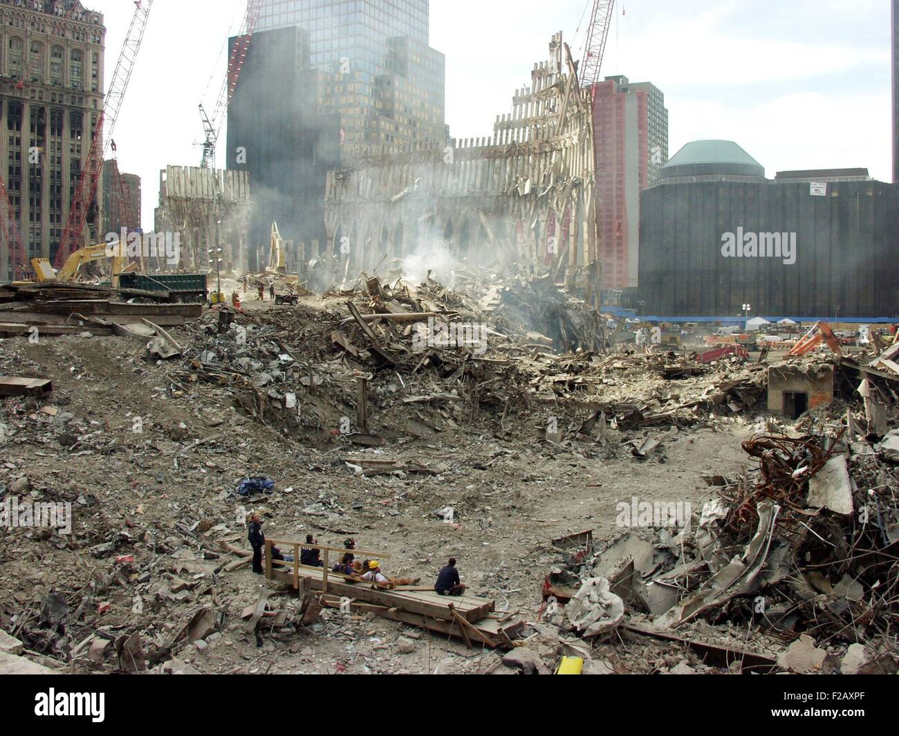 Pile of debris from the South Tower of World Trade Center a month after the terrorist attack. Oct. 10, 2001. The pile is reduced after a month of recovery operations searched for remains of the 479 firemen, police, and building workers lost when the WTC 2 collapsed. New York City, after September 11, 2001 terrorist attacks. (BSLOC 2015 2 117) Stock Photo