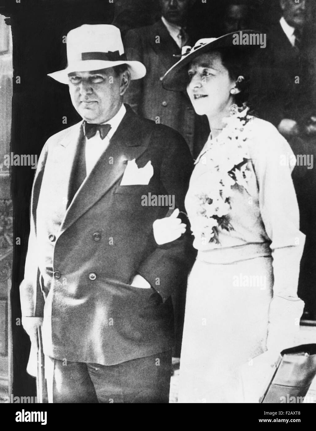 George Washington Hill, Chairman of American Tobacco Company. His advertisements successfully campaigns targeted women. He is with his new bride, Miss Mary Barnes, his former secretary, as they leave the London marriage bureau, July 14, 1935. (CSU 2015 9 974) Stock Photo