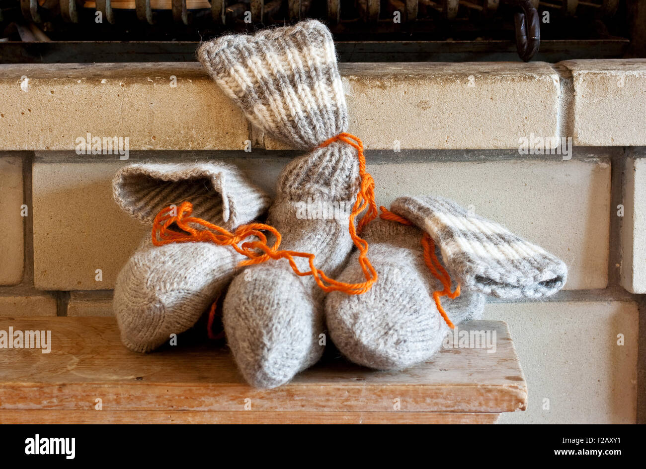 Sock full of candy under the chimney to the feast of St. Nicholas Stock Photo