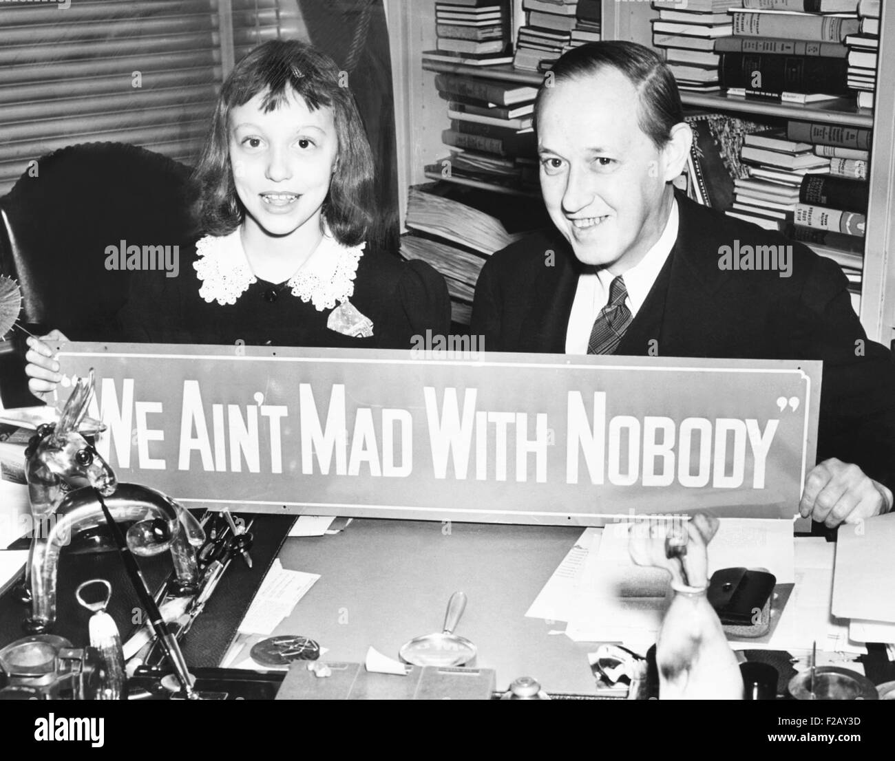 'We Ain't Mad With Nobody' is the Christmas message of Harry and Diana Hopkins. The widowed Hopkins and Diana lived in the FDR White House. Dec. 24, 1940. (CSU 2015 9 887) Stock Photo