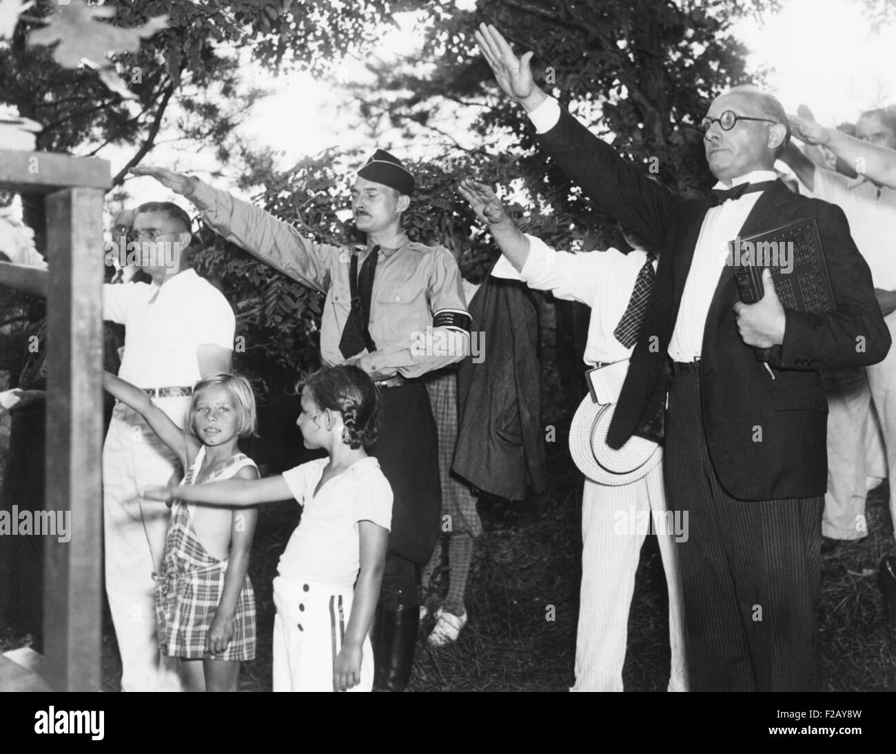 Germans in America give the Nazi salute commemorating Paul von Hindenburg. August 1, 1937, at Camp Siegfried, near Yaphank, New Stock Photo