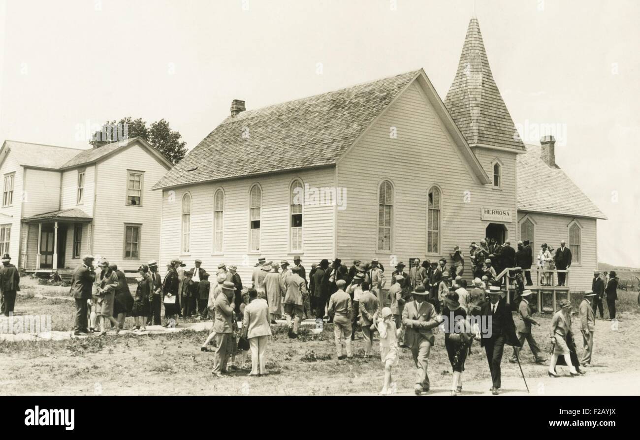 Congregational Church after Sunday service, Hermosa, South Dakota, in June 1927. President Calvin and Grace Coolidge spent a 3-month vacation at State Game Lodge in nearby Custer State Park. They attended church at Hermosa every Sunday of their Black Hills vacation. (CSU 2015 9 785) Stock Photo