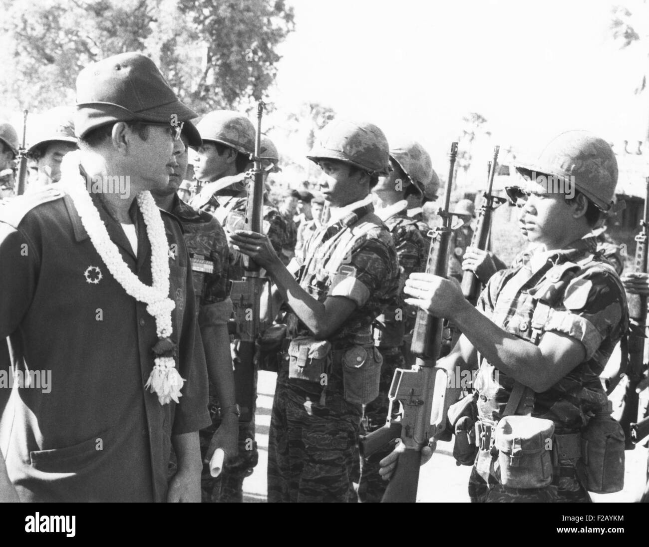 Cambodia's President Lon Nol reviews government troops on Nov. 28, 1973. Lon Nol's government was dependent on U.S. aid and Khmer Rouge insurgents were taking over large sections of the country. (CSU 2015 9 766) Stock Photo