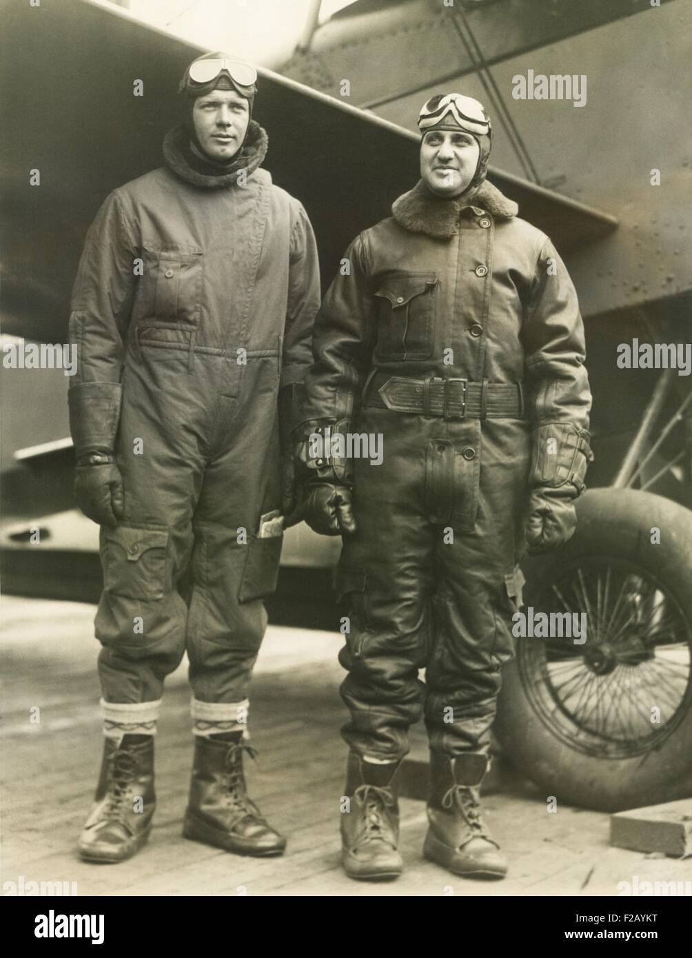 Col. Charles A. Lindbergh (left) and Harry F. Guggenheim in flight-suits. Dec. 8, 1928. The aviation pioneers took off from the Stock Photo